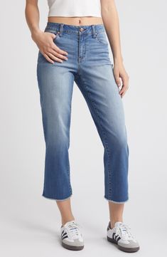 Keep it casual and cool in these faded mid-rise jeans styled with cropped, straight legs and fraying hems. 26" inseam; 15" leg opening; 9 1/2" front rise; 14 1/2" back rise Zip fly with button closure Five-pocket style 56% cotton, 24% rayon, 19% polyester, 1% spandex Machine wash, tumble dry Imported Medium Wash Straight Cropped Jeans With Frayed Hem, Denim Blue Straight Flare Jeans With Frayed Hem, Straight Cropped Jeans With Frayed Hem In Medium Wash, Spring Denim Blue Straight Cropped Jeans, Spring Denim Blue Cropped Straight Jeans, Fall Cropped Straight Jeans With Frayed Hem, Spring Straight Cropped Jeans In Denim Blue, Straight Bottoms With Frayed Hem For Spring, Spring Straight Bottoms With Frayed Hem