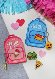 the back to school items are laid out next to each other, including a backpack and keychain