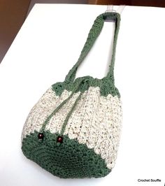 Presenting another perfectly-sized functional carry bag, crocheted in 100% cotton colors of avocado green (top, bottom and strap) and off white in the middle. A crochet cord with brown wooden buttons is the drawstring closure. Dimensions: 11.5"W x 12"D (29x30.5cms)  Strap is 23.5"L x 2"W (59.7x5cms) 100% hand crocheted by me! Cold water machine washable, air dry Each bag is securely wrapped and sent to you in either a padded mailer or box. If this is a gift and you would like me to mail your purchase to the recipient, please let me know at the time of purchase. Crochet Souffle Cheap Green Crochet Tote Bag, Cheap Green Crochet Shopping Bag, Cheap Green Crochet Satchel Bag, Cheap Green Satchel Crochet Bag, Cheap Green Crochet Crossbody Bag, Cheap Green Crossbody Crochet Bag, Cheap Green Crochet Bag For Travel, Affordable Green Summer Crochet Bag, Crocheted Fashion