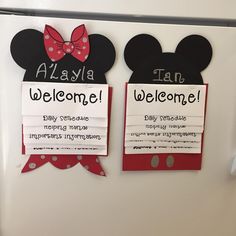 two mickey and minnie mouse welcome signs on a refrigerator door with magnets attached to them