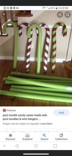 some green and white candy canes on the ground