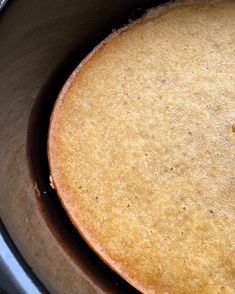 a close up of a cake in a pan on a stove top with the crust removed