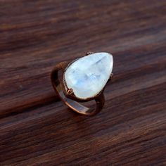 Natural Moonstone Gemstones Ring \ Electroformed Ring \ Minimal Ring \ Rings For Women \ Boho Rings \ Gifts For Women \ Handmade Jewelry Ring Size      : All Size Are Available Gemstone    : 20 X 14 MM Weight          : 5.30 gm Material        : Brass Polish            : Copper Antique Polish  . Contact us for wholesale prices. R I N G S https://www.etsy.com/in-en/shop/GemFormingStudio?section_id=22783374 B E A D S https://www.etsy.com/in-en/shop/GemFormingStudio?section_id=22828835 W A N D S ht Handmade Minimalist Moonstone Crystal Ring, Minimalist Handmade Moonstone Crystal Ring, Handmade Moonstone Stackable Rings For Promise, Minimalist Handmade Moonstone Ring, Handmade Moonstone Teardrop Ring, Handmade Minimalist Moonstone Ring, Handmade Minimalist Moonstone Open Ring, Handmade Minimalist Open Moonstone Ring, Handmade Moonstone Crystal Ring For Promise