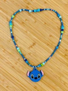 a necklace with a cartoon character on it