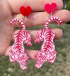 "Big and beautiful! Matte pink tigers attached to red heart shaped studs. The tigers feature hand painted details and measure 2.5\" tall." Tiger Earrings, Pink Tiger, Matte Pink, Curvy Fashion, Red Heart, Clay Earrings, Jewelry Earrings Dangle, Heart Shapes, Etsy Earrings