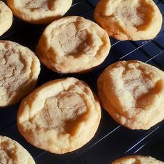 several cookies cooling on a wire rack