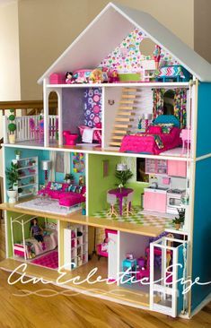 a doll house with lots of furniture and accessories