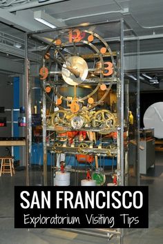 a large metal clock sitting in the middle of a room with text overlay reading san francisco exploratum visiting tips