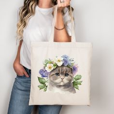 Perfect tote bag like a cat lover to enjoy everywhere with a lot of style. This 100% cotton bag comes in one size - 15" x 16" - perfect for everyday wear. While the canvas material will show off your designs in great colors, it's durable and will last for years. The bag features 20" handles (made from the same canvas), making it easy to carry even with a week's worth of shopping. .: 100% cotton canvas .: Available in natural color .: Heavy fabric (12 oz/yd² (406.9 g/m .: Sewn-in label .:Air dry or lay flat to dry. .:Avoid bleach or harsh detergents. TIME FOR PROCESSING & SHIPPING -Products are handmade and made to order. -Please give the shipping preparation 1-3 business days. -Sometimes when you order a lot of products, they may come in different packages. -As soon as an item is produced, Beige Rectangular Bag With Cat Design, Travel Tote Canvas Bag With Cat Design, Casual Canvas Bag With Cat Design For Travel, Casual Cat Design Tote Shoulder Bag, Daily Use Canvas Tote Bag With Cat Design, Everyday Canvas Tote Bag With Cat Design, Eco-friendly Rectangular Bag With Cat Design, Eco-friendly Tote Bag With Cat Design, Daily Use Cat Print Canvas Tote Bag