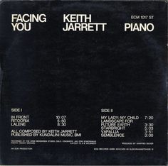 an album cover with the words facing you written in white on black, surrounded by smaller numbers