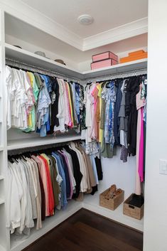 an organized closet with clothes and shoes