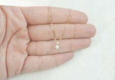 14k Diamond Necklace. Solitaire with Real Natural Diamond Pendant . gift for her. Gold daimond necklace. Solid Gold. Solitaire Diamond. This diamond necklace is perfect for everyday wear. its gentle and delicate. ♥ About The Necklace: Made of real 14k solid yellow \ white gold. Diamond is 0.20 carat. Clearly is SI Color is G-H REAL DIAMOND . The necklace length can be 42\45 cm ♥ All necklaces are packaged and shipped in a beautiful gift box. Thank you for visiting my shop! Maya. Diamond Necklace Solitaire, Solitaire Diamond, Beautiful Gift Boxes, Real Diamonds, Necklace Length, Solid Yellow, Diamond Solitaire, Diamond Pendant, Yellow White