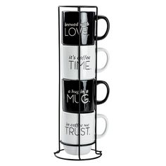 three coffee mugs stacked on each other with the words love and time printed on them