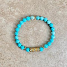 Sleeping beauty turquoise beads in stretch fit made with elastic cord. Wear it up or down by itself or stacked with your other fine and fashion bracelets for the perfect arm candy. Fits common size wrist and can stretch a bit over time. Turquoise is associated with meanings of refreshing, feminine, calming, sophisticated, energy, wisdom, serenity, wholeness, creativity, good luck, spiritual grounding, friendship, love, joy, tranquility, patience, intuition, and loyalty. Throat Chakra.-This infor Spiritual Grounding, Friendship Love, Sleeping Beauty Turquoise, Throat Chakra, Arm Candy, Turquoise Beads, Fashion Bracelets, Sleeping Beauty, Chakra