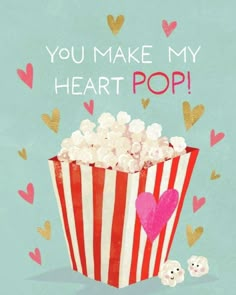 a popcorn box with hearts on it and the words you make my heart pop above it