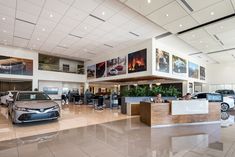 a car showroom filled with lots of cars