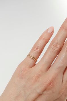 ITEM INFO Crafted with precision and attention to detail, this ring features a sleek and elegant double line design. Made with 14K solid gold for durability and a luxurious shine. The open free one size design allows for easy adjustment and ensures a comfortable fit. Perfect for wearing on the pinky finger or as a stackable ring for a trendy look. The minimalist design makes it versatile and suitable for everyday wear or special occasions. Elevate your style with our 14K Solid Gold Double Line Open Free One Size Pinky Baby Ring and make a fashion statement. PRODUCT INFO Metal Type: 14K Gold Gram Weight: 0.85G Measurements: Size 3 Made by South Korea Ship From Los Angeles (U.S) ................................... Permanent Rings, Ring For Pinky Finger, Pinky Finger Ring, Baby Ring, Pinky Finger, Gold Pinky Ring, Baby Rings, Minimal Ring, Gold Rings Simple