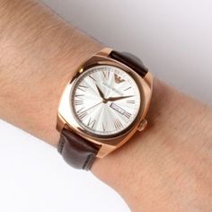 Emporio Armani Men's Brown Leather Quartz Dress Watch Rose Gold-Tone Stainless Steel Case. Leather Strap. White Dial. Quartz Movement. Date. Water Resistant 50 Meters. Case 41 Mm. Rose Gold Watches, Armani Men, Dress Watch, White Dial, Quartz Movement, Emporio Armani, Stainless Steel Case, Accessories Watches, Leather Men