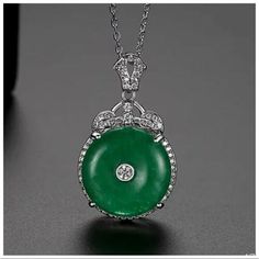 Made Using Swarovski Crystals The Cristyana Jade Green Crystal Necklace S8 | eBay Luxury Jade Necklace For Gift, Elegant Round Jade Crystal Necklaces, Elegant Jade Pendant Crystal Necklace, Elegant Jade Necklace Round Shape, Elegant Jade Round Necklace, Formal Jade Necklace With Round Pendant, Exquisite Round May Birthstone Necklace, Elegant Round Jade Necklace, Elegant Jade Crystal Necklace As Gift