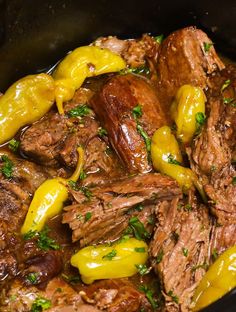 the meat and peppers are being cooked in the slow - cooker to be eaten