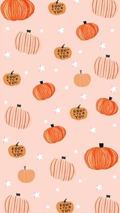 an orange and white pattern with pumpkins on it's side, stars in the background