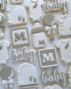 some cookies that are shaped like baby items