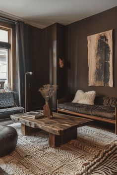 a living room with two couches and a coffee table in front of a window