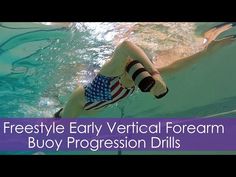 a woman in an american flag swimsuit is swimming under water with the words freestylely early vertical formam buoy progression drills