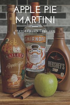 apple pie martini ingredients on a wooden table