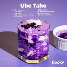 a purple dessert with blueberries and other toppings