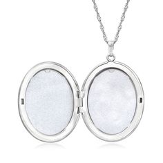 Ross-Simons - Single-Initial - Sterling Silver Floral Locket Necklace. Etched with a scrolling floral motif, our sterling silver oval locket has the aura of a vintage-style keepsake. Make it meaningful with a FREE engraving on the back of a single initial in your choice of block or script type. Suspends from a Singapore chain that adjusts from 24" to choker length. Fits a 1 3/16" x 7/8" photo inside. Lobster clasp, sterling silver personalized locket necklace. Oval White Gold Jewelry With Sterling Silver Clasp, White Gold Jewelry With Sterling Silver Clasp, White Oval Sterling Silver Locket Necklace, White Oval Locket Necklace In Sterling Silver, Silver Oval Pendant Jewelry With Engraving Option, Silver Jewelry With Engraving Option, Oval Pendant, Formal Sterling Silver Locket Necklace With Polished Finish, Elegant Sterling Silver Oval Link Locket Necklace, Elegant Sterling Silver Locket Necklace With Oval Link