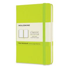 a bright green notebook with white pages