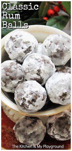 a white bowl filled with chocolate rum balls