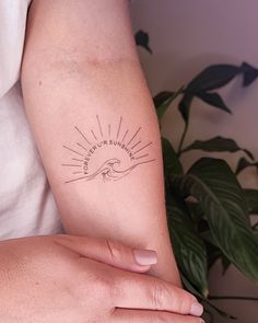 a woman's arm with a tattoo on it that reads, keep your sunshine