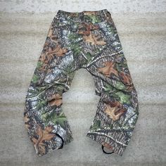 Vintage Mossy Oak Hunting Camo Tactical Pants Baggy Fit Cargos Crazy Woodland Pattern 90s Skate / Streetwear Great Condition: 9/10 Men's Size:  Waist: 32" Length (inseam): 32" Leg Opening: 9.5" Thigh Opening: 13" Front Rise: 13.5" Baggy Combat Cargo Pants For Outdoor Activities, Baggy Combat Pants For Outdoor, Fall Outdoor Techwear Bottoms, Fall Techwear Bottoms For Outdoor, Hip Hop Style Baggy Cargo Jeans For Outdoor, Baggy Hip Hop Cargo Jeans For Outdoor, Camouflage Cargo Pants For Outdoor, Fall Outdoor Techwear Pants, Combat Style Baggy Parachute Pants