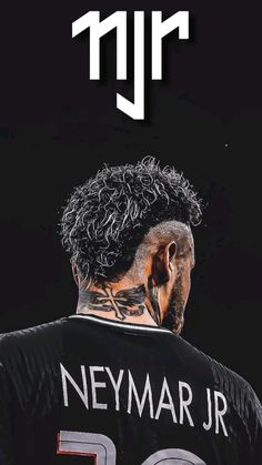 the back of a man's head with tattoos on his face and neck, in front of a black background