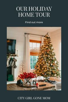 a christmas tree in the corner of a living room with presents on it and an advertisement for