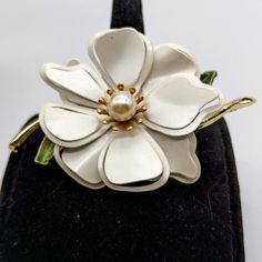 Nwot The White Flower Brooch Has A Very Slight Metallic Sheen, Giving It Elegance. The Central Pearl 3/4 Of An Inch , Surrounded By Gold Stamen. There Are Two Layers Of Petals --5 On Top--5 Underneath, Alternating For Added Dimension And Fullness, A Tiny Bit Of Gold Stem And Green Leaf Poke Out On One Side. Note: The Pearl Is Picking Up Reflections From The Surrounding Stamen. These Are Not Call Outs. Excellent Condition. Flower Shaped Brooch For Spring Wedding, Flower-shaped Brooch For Spring Wedding, White Brooches With Flower Decoration For Formal Occasions, White Flower Decorated Brooches For Formal Occasions, White Flower Decoration Brooches For Formal Occasion, Formal White Brooches With Flower Decoration, Flower Shaped Wedding Brooch For Spring, White Flower Brooches With Flower Decoration, Formal Flower Brooch For Spring