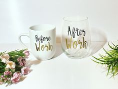 two coffee mugs sitting next to each other on top of a white countertop