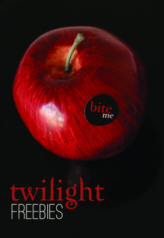 a red apple sitting on top of a black background with the words twilight freebies below it