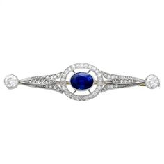 Antique 1.25Ct Sapphire 2.34Ct Diamond and Platinum Brooch Circa 1925 For Sale at 1stDibs Brooch Design, Bar Brooch, Halo Style, Antique Brooches, Diamond Brooch, European Cut Diamonds, Sapphire Jewelry, Diamond Jewellery, Dream Jewelry