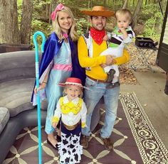 a family dressed up in costumes for halloween