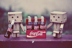 two little people made out of soda bottles