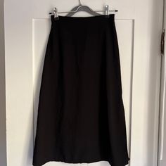 Never Worn Before! Black Midi Skirt From Brandy. Black Lined Maxi Skirt For Work, Classic Black Relaxed Maxi Skirt, Black Relaxed Classic Maxi Skirt, Classic Relaxed Black Maxi Skirt, Formal Black Lined Maxi Skirt, Black Midi Pencil Skirt With Lining, Black Lined Midi Pencil Skirt, Classic Black Flared Maxi Skirt, Black Long Pencil Skirt With Lining