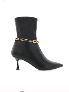 Introducing the must-have Billini Verna Boot! With a convenient side zipper and chic gold chain detail, these boots will elevate any outfit. Step out in style and make a statement with these fashionable and versatile boots.*NOT ELIGIBLE FOR DISCOUNTS Trendy Chain Boots For Fall, Chain Boots For Party In Fall, Chain Boots For Fall Party, Party Boots With Chain Strap For Fall, Fall Party Boots With Chain Strap, Chic Boots With Chain Strap For Night Out, Chic Chain Strap Boots For Night Out, Elegant Boots With Chain Strap For Night Out, Stepping Out