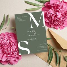 wedding stationery with peonies and envelopes