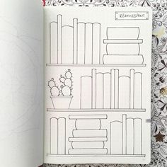 an open notebook with drawings of books and plants on it in front of a floral background