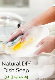 a person washing dishes with a sponge and rag