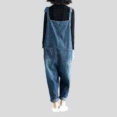 Make a statement this season with our new-millennium-style 2023 Autumn Collection Patchwork Denim Jumpsuit! Boasting a loose fit. patchwork-style design. and suspenders closure. this one-of-a-kind piece is perfect for those who want to stay ahead of the trend.Distinctive Features: Y2K Style: Take a trip back in time with our vintage-inspired Y2k-style denim jumpsuit! Patchwork Design: Our denim jumpsuit features patchwork-style patches on the legs for a unique. edgy look. Baggy Fit: Our jumpsuit Denim Bib Front Overalls, Fall Medium Wash Bib Front Denim Jumpsuit, Blue Baggy Straight Leg Overalls, Baggy Blue Straight Leg Overalls, Blue Denim Overall Jumpsuit With Pockets, Utility Denim Blue Jumpsuit With Bib Front, Utility Style Denim Blue Bib Front Jumpsuit, Denim Blue Bib Front Utility Jumpsuit, Denim Bib Front Jumpsuit For Fall