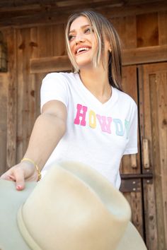 A super cute white v-neck top with the perfect mix of pastel colors that spell "HOWDY" Patch Top, V Neck Tops, Pastel Colors, Super Cute, Pastel, T Shirts For Women, V Neck